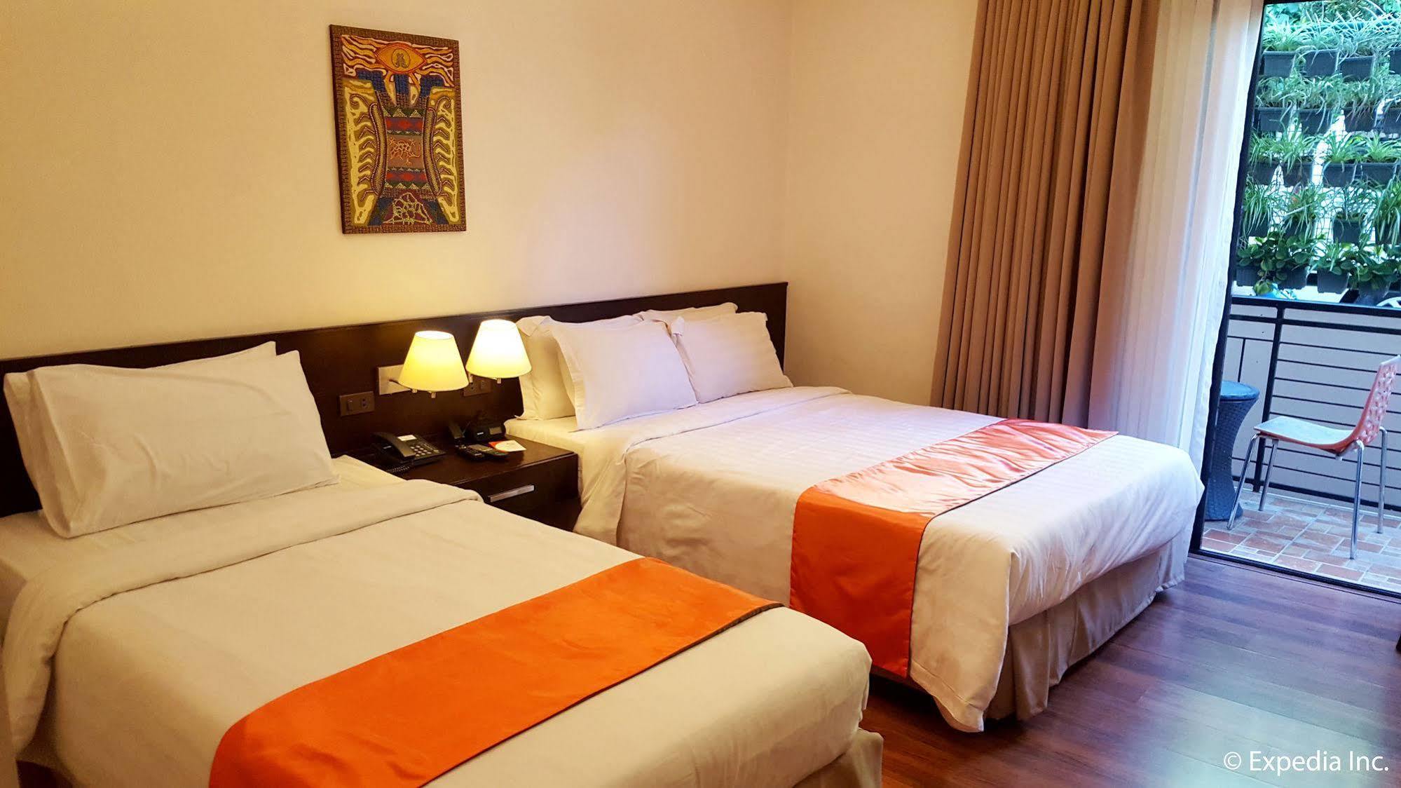באגויו Giraffe Boutique Hotel מראה חיצוני תמונה